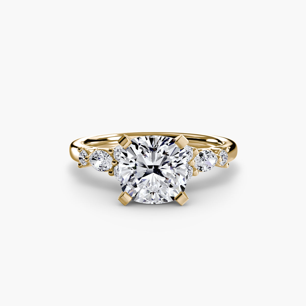 The Floral Accent Solitaire engagement ring in yellow gold with a cushion-cut centre stone