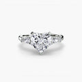 The Floral Accent Solitaire engagement ring in white gold with a heart-shaped centre stone