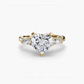The Floral Accent Solitaire engagement ring in yellow gold with a heart-shaped centre stone