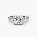 The Floral Accent Solitaire engagement ring in white gold with a princess-cut centre stone