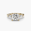 The Floral Accent Solitaire engagement ring in yellow gold with a princess-cut centre stone