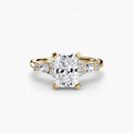 The Floral Accent Solitaire engagement ring in yellow gold with a radiant-cut centre stone