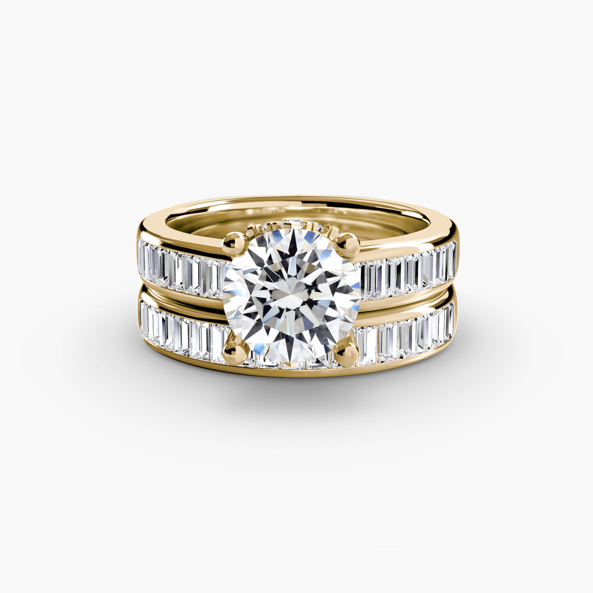 Baguette Channel Solitaire engagement ring in yellow gold with a round centre stone