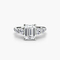 Five Stone Ring with Pavé Band in white gold with an emerald-cut centre stone
