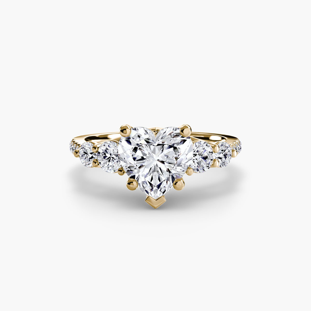 Five Stone Ring with Pavé Band in yellow gold with a heart-shaped centre stone