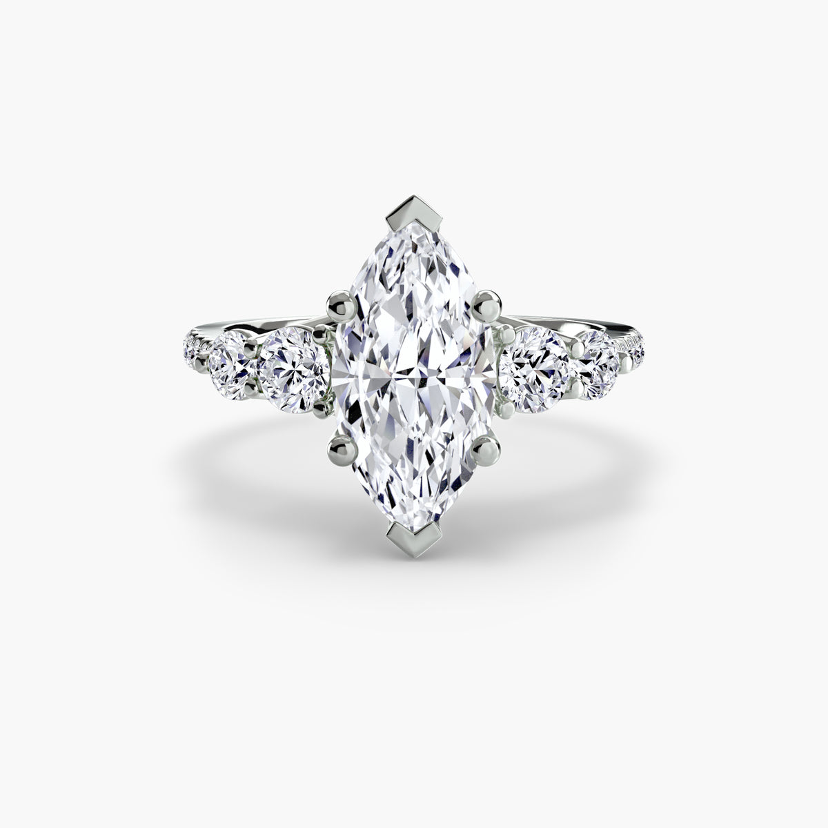Five Stone Ring with Pavé Band in white gold with a marquise centre stone