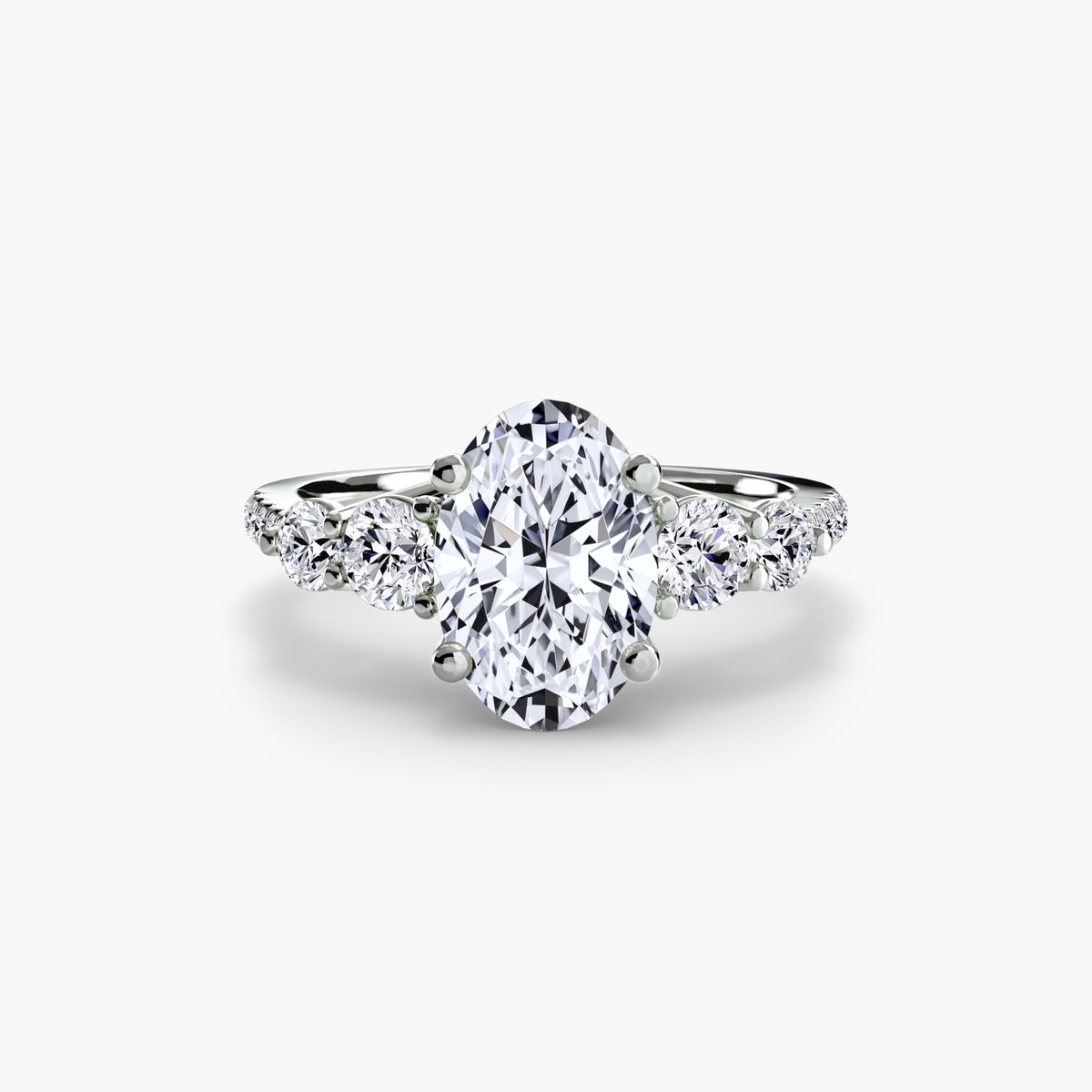Five Stone Ring with Pavé Band in white gold with an oval centre stone