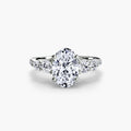 Five Stone Ring with Pavé Band in white gold with an oval centre stone