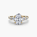 Five Stone Ring with Pavé Band in yellow gold with an oval centre stone