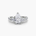 Five Stone Ring with Pavé Band in white gold with a pear-shaped centre stone