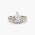 Five Stone Ring with Pavé Band in yellow gold with a pear-shaped centre stone