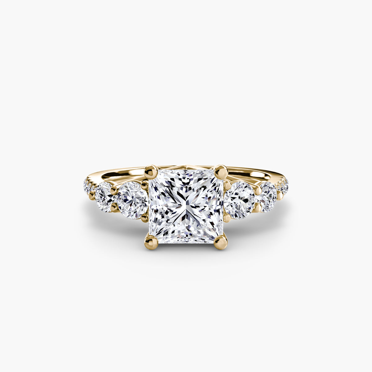Five Stone Ring with Pavé Band in yellow gold with a princess-cut centre stone