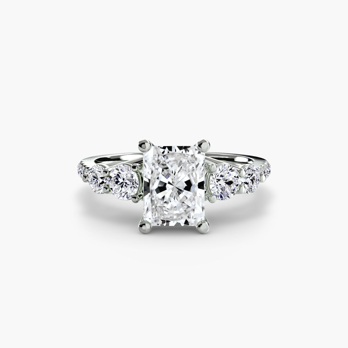Five Stone Ring with Pavé Band in white gold with a radiant-cut centre stone