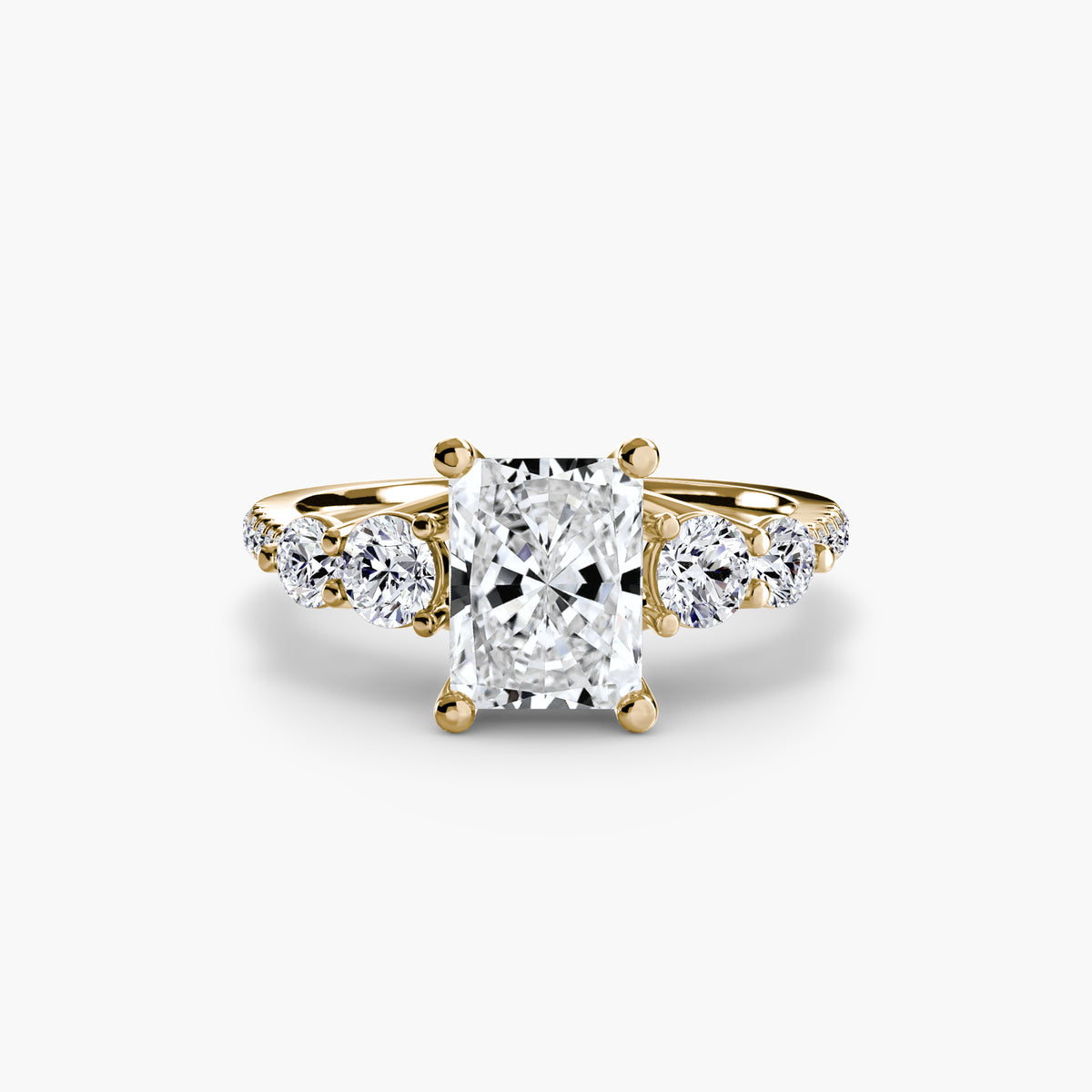 Five Stone Ring with Pavé Band in yellow gold with a radiant-cut centre stone