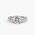 Five Stone Ring with Pavé Band in yellow gold with a round centre stone