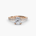 Solitaire with Pavé engagement ring in rose gold with a cushion-cut centre stone