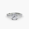 Solitaire with Pavé engagement ring in white gold with a cushion-cut centre stone