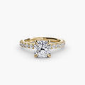 Solitaire with Pavé engagement ring in yellow gold with a cushion-cut centre stone