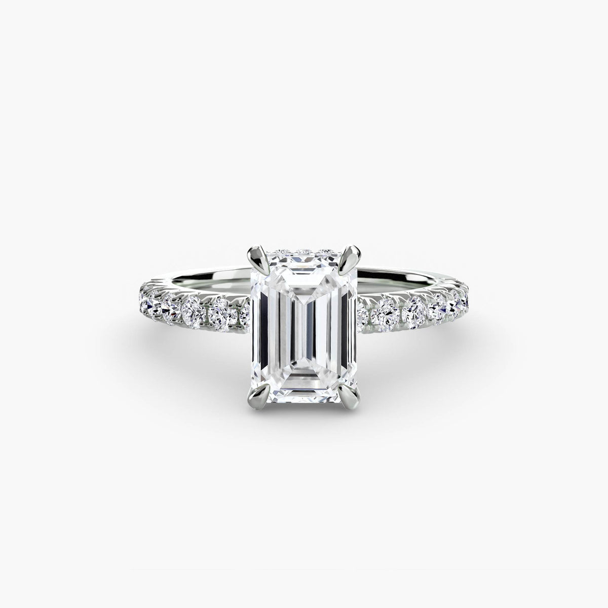 Solitaire with Pavé engagement ring in white gold with an emerald-cut centre stone