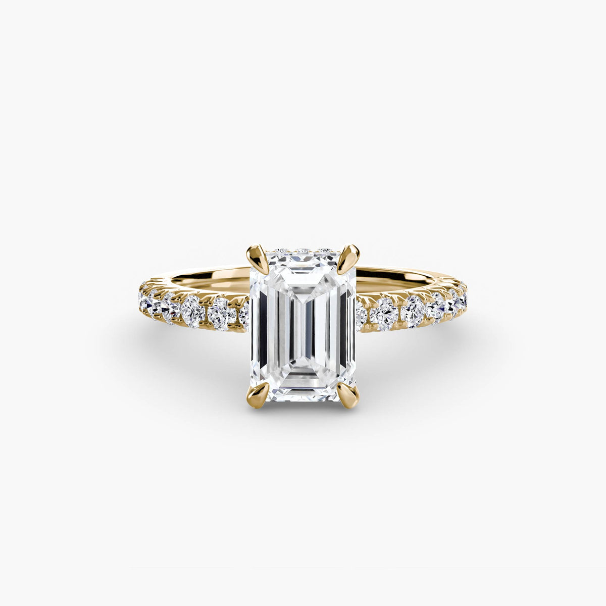 Solitaire with Pavé engagement ring in yellow gold with an emerald-cut centre stone