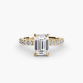 Solitaire with Pavé engagement ring in yellow gold with an emerald-cut centre stone