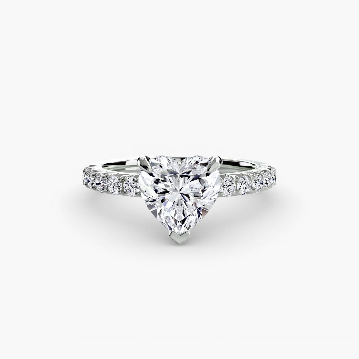 Solitaire with Pavé engagement ring in white gold with a heart-shaped centre stone