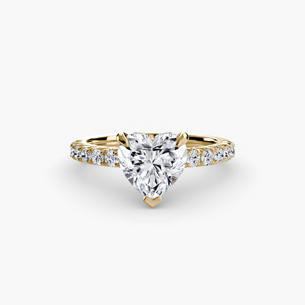 Solitaire with Pavé engagement ring in yellow gold with a heart-shaped centre stone