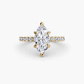 Solitaire with Pavé engagement ring in yellow gold with a marquise centre stone