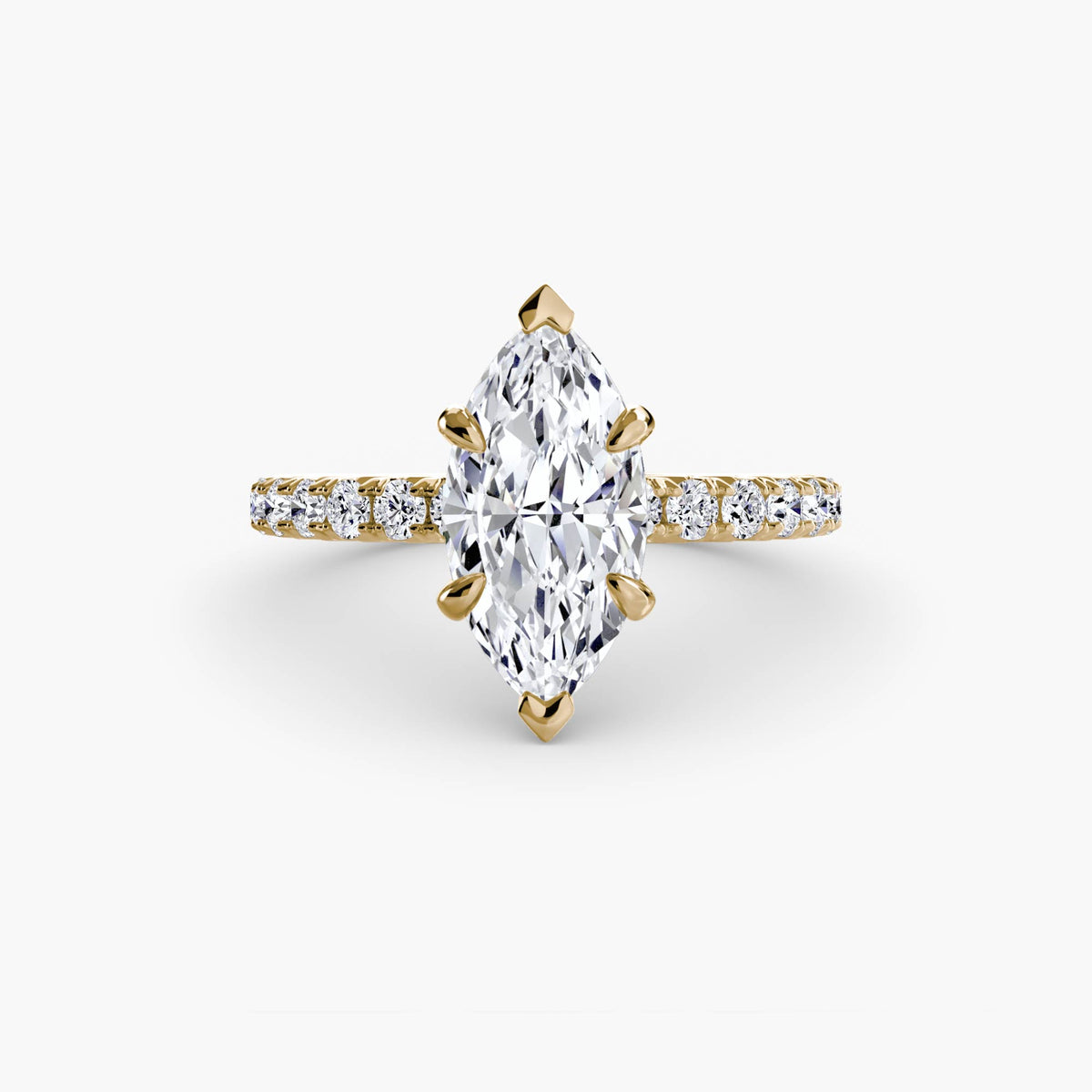 Solitaire with Pavé engagement ring in yellow gold with a marquise centre stone