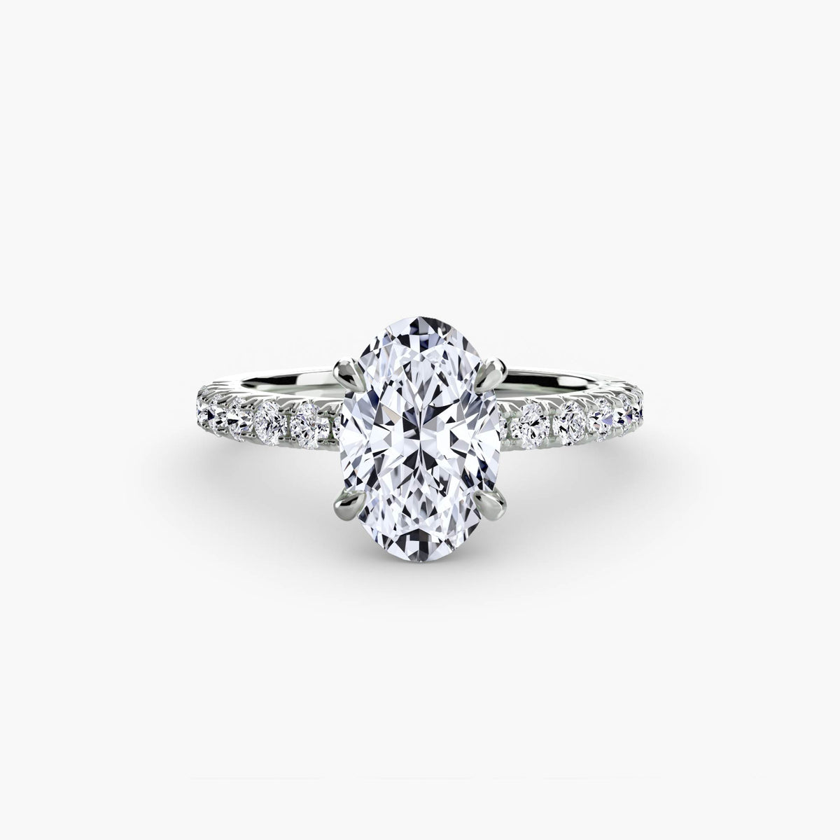 Solitaire with Pavé engagement ring in white gold with an oval centre stone