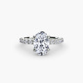 Solitaire with Pavé engagement ring in white gold with an oval centre stone