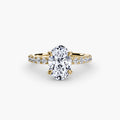 Solitaire with Pavé engagement ring in yellow gold with an oval centre stone