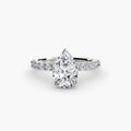 Solitaire with Pavé engagement ring in white gold with a pear-shaped centre stone