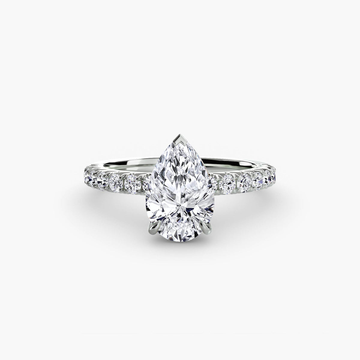 Solitaire with Pavé engagement ring in white gold with a pear-shaped centre stone