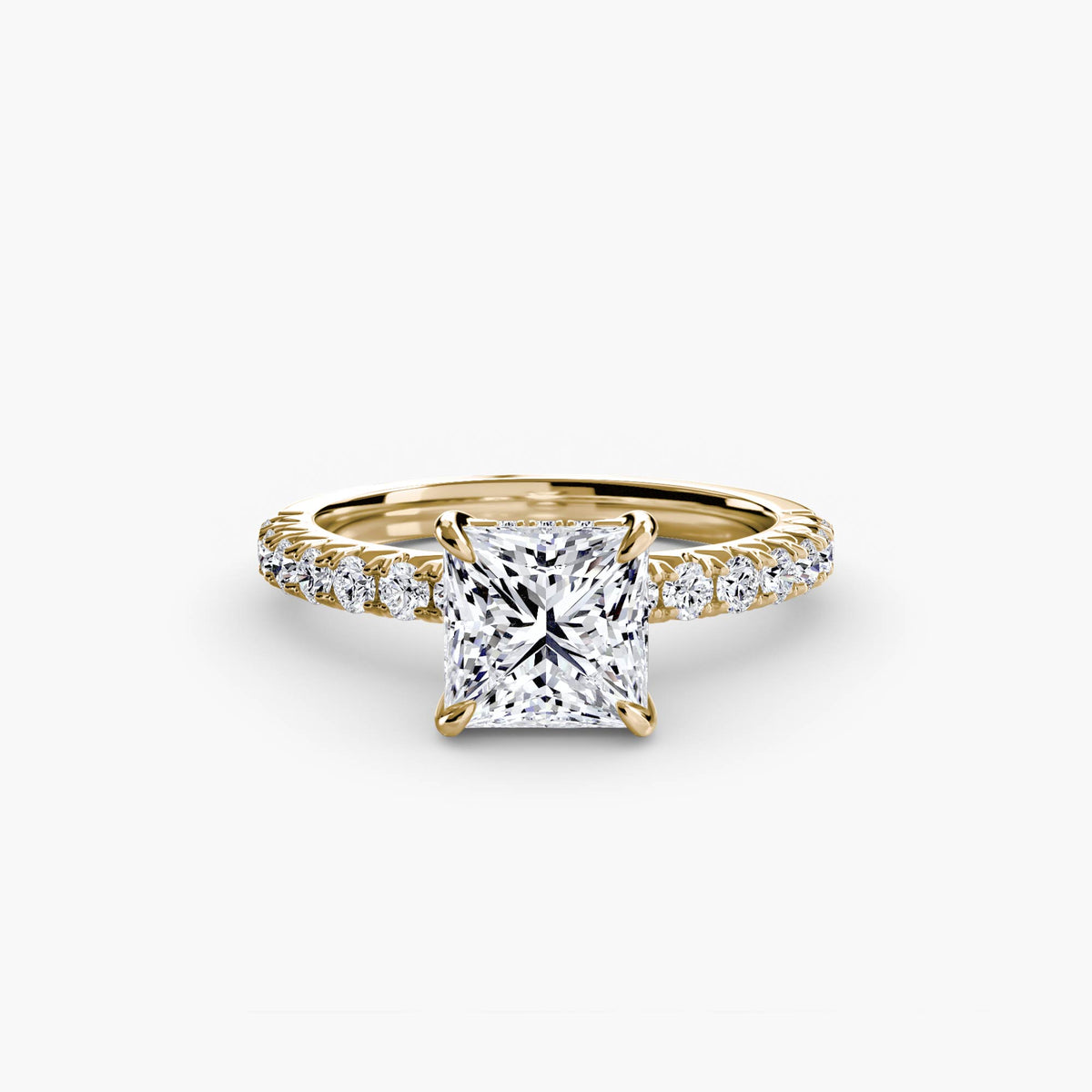 Solitaire with Pavé engagement ring in yellow gold with a princess-cut centre stone