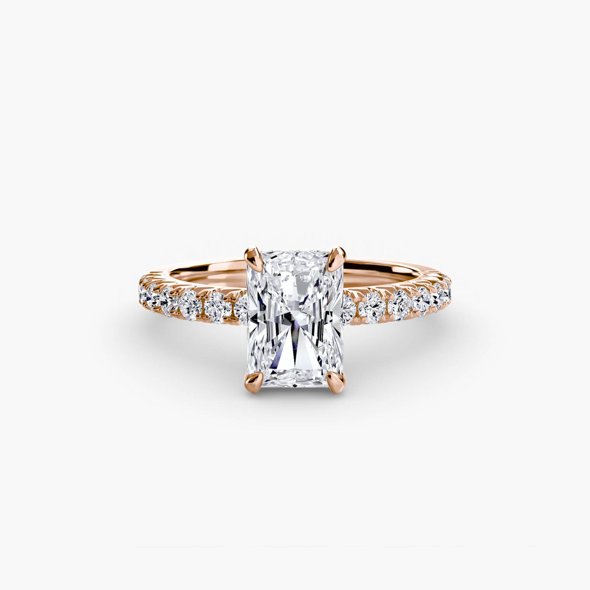Solitaire with Pavé engagement ring in rose gold with a radiant-cut centre stone