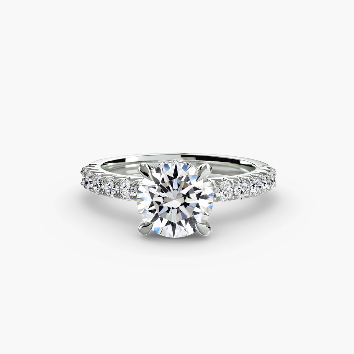 Solitaire with Pavé engagement ring in white gold