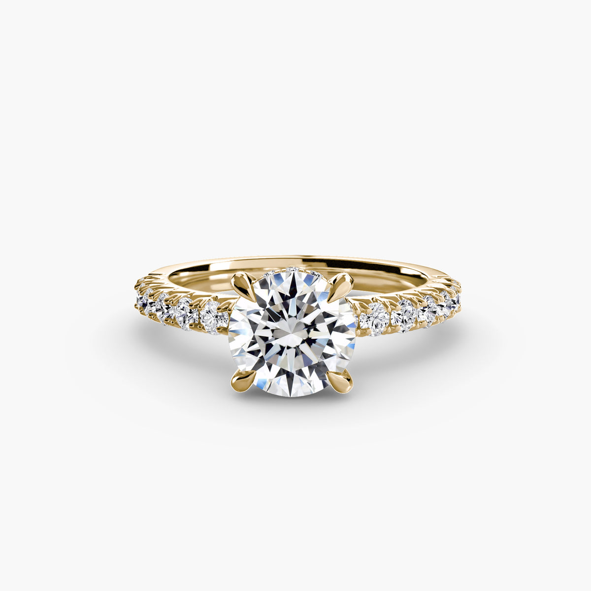 Solitaire with Pavé engagement ring in yellow gold with a round centre stone