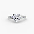 Solitaire with Pavé engagement ring in white gold with a heart-shaped centre stone