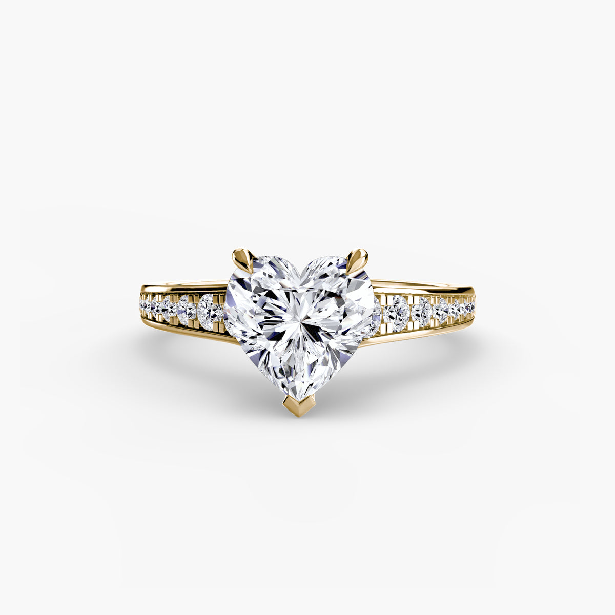 Solitaire with Pavé engagement ring in yellow gold with a heart-shaped centre stone