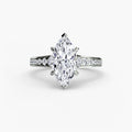 Solitaire with Pavé engagement ring in white gold with a marquise centre stone