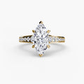 Solitaire with Pavé engagement ring in yellow gold with a marquise centre stone