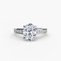 Solitaire with Pavé engagement ring in white gold with an oval centre stone