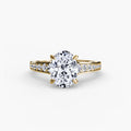 Solitaire with Pavé engagement ring in yellow gold with an oval centre stone