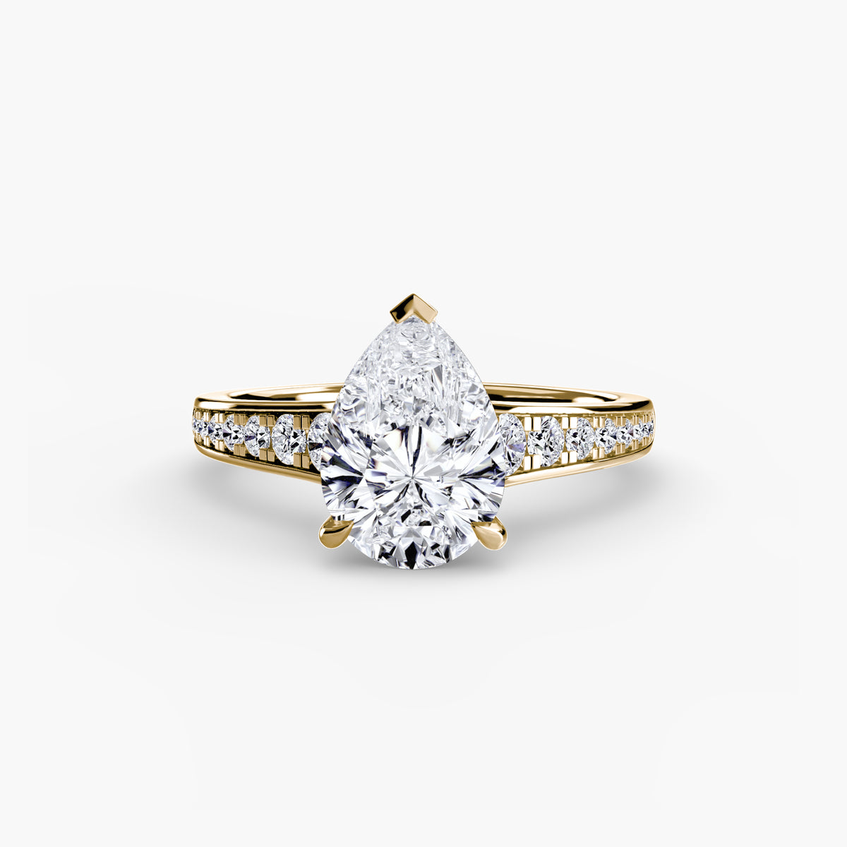 Solitaire with Pavé engagement ring in yellow gold with a pear-shaped centre stone