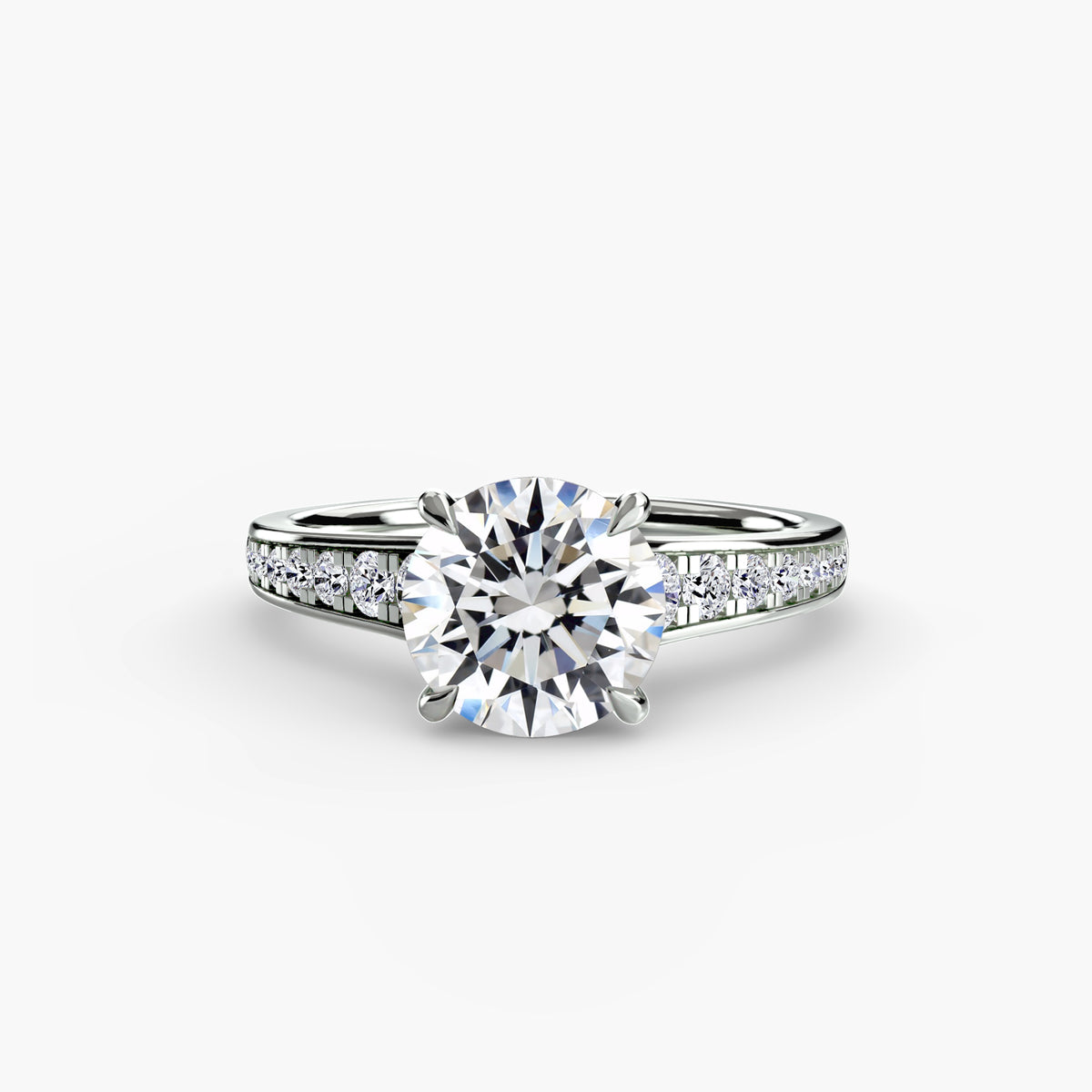 Solitaire with Pavé engagement ring in white gold with a round centre stone