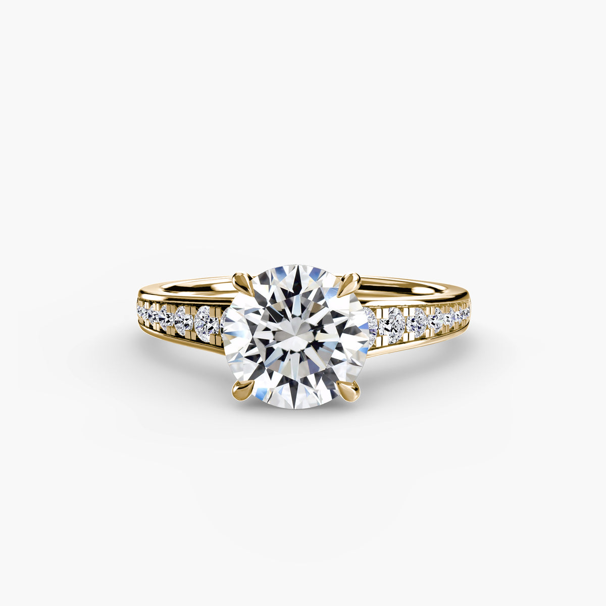 Solitaire with Pavé engagement ring in yellow gold with a round centre stone