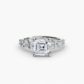The Graduated Accent Ring in white gold with an Asscher-cut centre stone