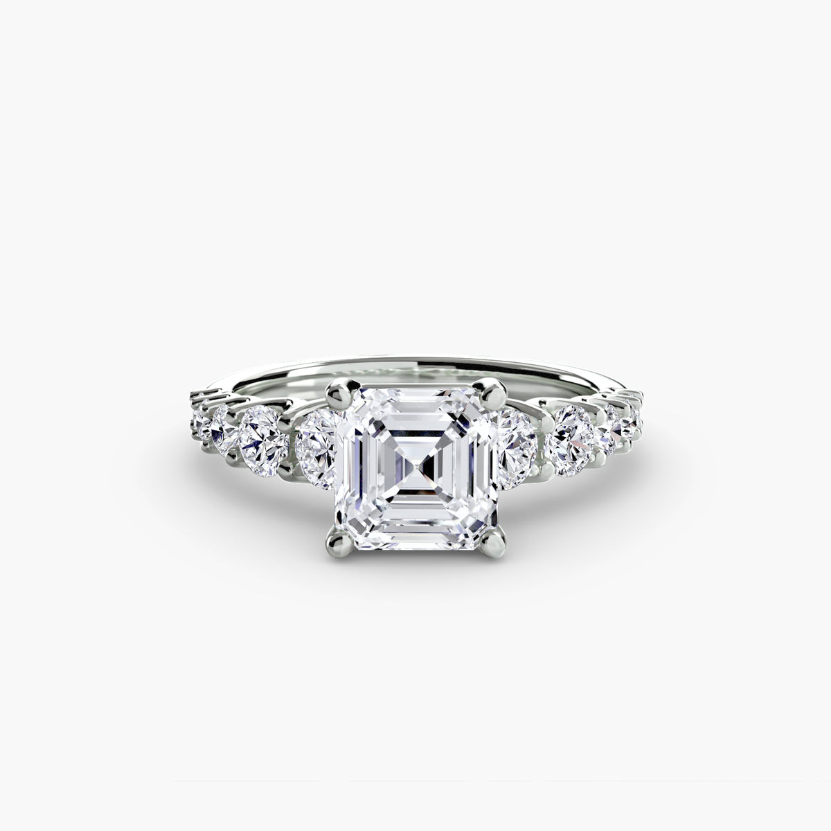 The Graduated Accent Ring in white gold with an Asscher-cut centre stone