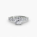 The Graduated Accent Ring in white gold with a cushion-cut centre stone